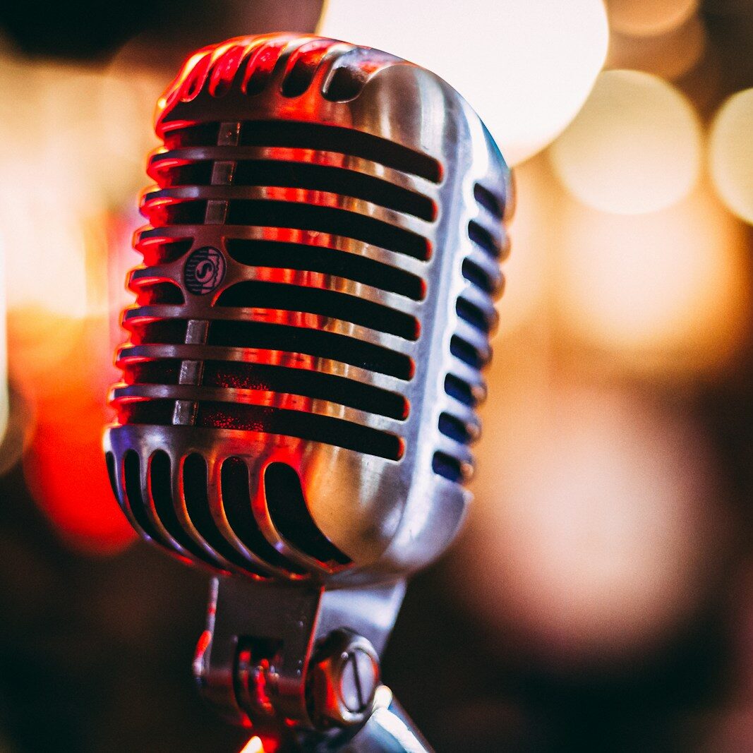 bokeh photography of condenser microphone